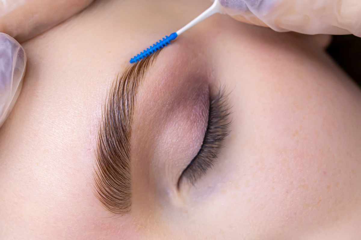 Combination brow lamination and shaping technique for fuller, defined brows. Achieve a natural, polished look with long-lasting results