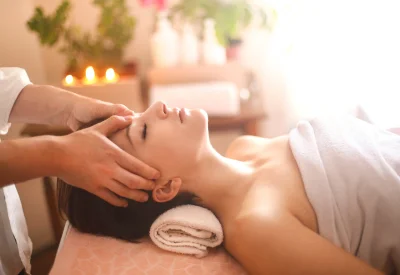 Person receiving a relaxing massage at home