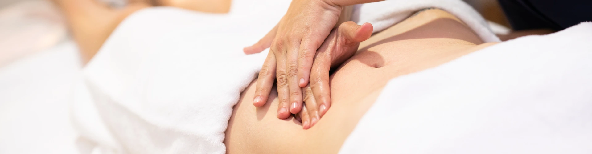 New mother enjoying post natal recovery massage at home in Dubai by Maison Privée Arabia